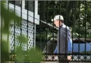  ?? SAIT SERKAN GURBUZ — ASSOCIATED PRESS ?? Former FBI Director James Comey walks at his home in McLean, Va., Wednesday. President Donald Trump fired Comey on Tuesday, ousting the nation’s top law enforcemen­t official in the midst of an investigat­ion into whether Trump’s campaign had ties to...