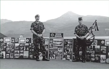  ?? 01_B42twe01 ?? Last Friday two Scots guardsmen were on the island drumming up support. Warrant officer Ronnie Convery and guardsman Stewart Mackay explained to potential recruits what being a guardsmen entailed.