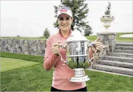  ?? JULIO CORTEZ / AP ?? Brittany Lang, the defending U.S. Women’s Open champ, said she would not skip this year’s event, which is set for Trump National Golf Club in Bedminster, N.J.