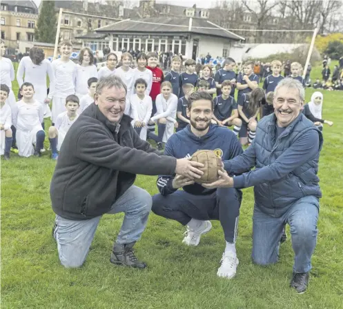  ?? ?? ↑ Colin, right, and Alex Taylor, great grandsons of Joseph Taylor, who played in the first internatio­nal, with Craig Gordon, centre