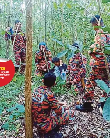  ??  ?? ANGGOTA bomba menemui semula Saidin yang dilaporkan hilang di bukit Kampung Kuala Abai, Kota Belud.