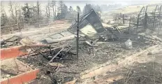  ?? SIERRA GARNER PHOTO/HANDOUT, THE CANADIAN PRESS ?? Fire damage to the Rocking Heart Ranch near Waterton Lakes National Park.