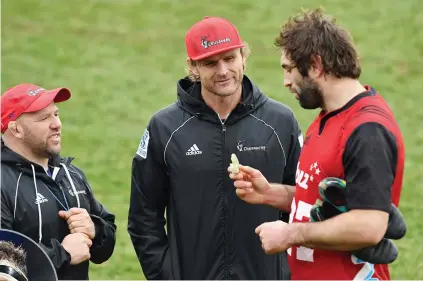  ?? Picture: Getty Images ?? MEETING OF MINDS. Assistant coach Jason Ryan (left), head coach Scott Robertson and captain Sam Whitelock discuss tactics during the Crusaders training session in Christchur­ch yesterday.