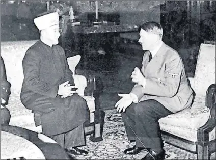  ?? Photo: AFP ?? Distortion: Mohammad Amin Al-Husseini meets Adolf Hitler in Berlin in 1941. Claims by Israel’s prime minister that Hitler ordered the genocide of Jews at Al-Husseini’s urging have been slammed by historians.