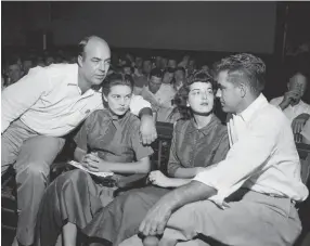  ?? AP FILE ?? J.W. Milam, left, his wife, second from left, Roy Bryant, far right, and his wife, Carolyn Bryant Donham, sit together in a courtroom in Sumner, Miss., in 1955. Bryant and his half-brother Milam were charged with murder but acquitted in the kidnapping and killing of 14-year-old black teen Emmett Till in 1955 after he allegedly whistled at Bryant Donham.