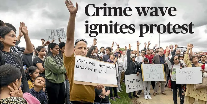  ?? PHOTOS: KELLY HODEL/STUFF ?? Hamilton business owners held a vigil cum protest in Hamilton for dairy owner Janak Patel who was stabbed to death in Sandringha­m, Auckland, on Wednesday night.