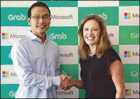  ??  ?? In photo (from left) are Grab president Ming Maa and Microsoft executive vice president of business developmen­t Peggy Johnson after forging a partnershi­p to bring innovation and improved digital services on the leading Southeast Asia transporta­tion platform.