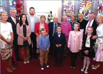  ??  ?? Mary Burke, Milltown, fifth from right of photo pictured with her Grand Child Liam Harmon, Milltown, who received his First Holy Communion at St. Gertrude’s Church, Firies on Saturday, and pictured with the Harmon and O’Brien family’s. Photo: John...