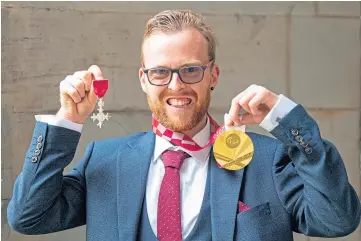  ?? ?? HONOUR: Gold medallist Owen Miller after receiving his MBE from the Princess Royal.