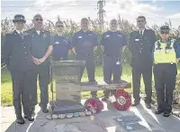  ??  ?? Representa­tives from Cheshire Police, Cheshire Fire and Rescue Service and North West Ambulance Service at the new memorial