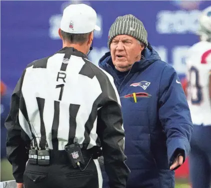  ?? ROBERT DEUTSCH/USA TODAY SPORTS ?? New England Patriots head coach Bill Belichick talks to referee Scott Novak (1) on Nov. 26 at MetLife Stadium.