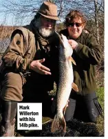  ??  ?? Mark Willerton with his 14lb pike.