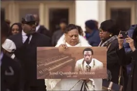  ?? AP file photo ?? A scene from Jemel Roberson's funeral in Chicago last month. Roberson, who was working security at a bar, was killed while holding at gunpoint a man involved in a shooting in the tavern.