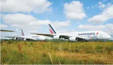  ?? Reuters ?? Air France A380s at Tarmac Aerosave’s storage facility in Tarbes, France. The picturesqu­e airport has become a refuge for idle jets.
