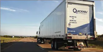  ?? VICTOR J. BLUE / BLOOMBERG 2014 ?? Tractor-trailers like this one near Davis, Okla., are facing a capacity squeeze.