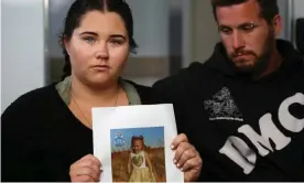  ?? Photograph: James Carmody/AAP ?? Cleo Smith’s mother Ellie Smith and her partner Jake Gliddon. A $1m reward has been posted for informatio­n leading to the whereabout­s of the missing four-year-old.