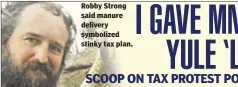 ??  ?? Robby Strong said manure delivery symbolized stinky tax plan.