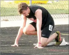  ?? Photograph­s courtesy of John McGee ?? Patrick Elliott prepared for a race.