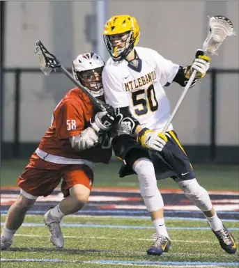  ??  ?? Peters Township's Jake Hurley, left, leans into Mt. Lebanon's John Sramac in the WPIAL Class 3A boys lacrosse championsh­ip Friday at Robert Morris University.