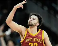  ?? Charlie Riedel / Associated Press ?? Iowa State guard Gabe Kalscheur celebrates after making a basket during the second half of a Big 12 Conference Tournament game. Things didn’t go as well in the first round of the NCAA Tournament.