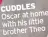  ?? ?? CUDDLES Oscar at home with his little brother Theo