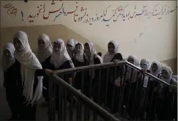  ?? FELIPE DANA — THE ASSOCIATED PRESS ?? Girls walk upstairs as they enter a school before class in Kabul, Afghanista­n, Sunday.