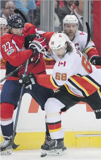  ?? NICK WASS/THE ASSOCIATED PRESS ?? Calgary Flames winger Jaromir Jagr has been battling it out in the NHL for close to three decades, so when he gives advice, young teammates like Johnny Gaudreau listen.