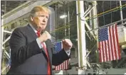  ?? Craig J. Orosz Lima News ?? PRESIDENT TRUMP makes his entrance to the Joint Systems Manufactur­ing Center in Lima, Ohio.