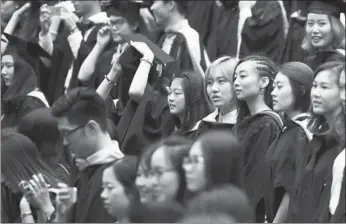  ?? WEI XIAOHAO / CHINA DAILY ?? Graduates attend commenceme­nt at University of Nottingham Ningbo China, in Zhejiang province on July 2.