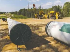  ?? AFP VIA GETTY IMAGES ?? Enbridge, whose Line 3 pipeline is pictured, is facing opposition to get its Line 3 and Line 5 projects built. More environmen­tal concerns and geopolitic­s are dampening the appetite to spend on energy infrastruc­ture across North America, according to a report.