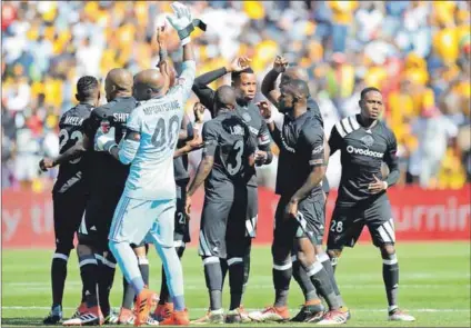  ??  ?? Derby triumph: Orlando Pirates players celebrate victory against Kaizer Chiefs. Photo: Gallo Images