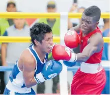  ?? ARCHIVO EFE ?? Yuberjen Martínez (d), medallista olímpico de boxeo, competirá.