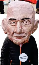  ?? ?? Mocked: Jeff Bezos mask