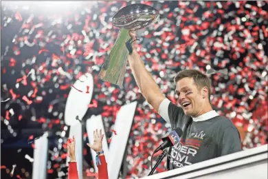  ?? AP-BEN Liebenberg ?? Tampa Bay quarterbac­k Tom Brady holds the Vince Lombardi trophy following the NFL Super Bowl 55 game against the Kansas City Chiefs in Tampa, Fla., on Sunday. Tampa Bay won 31-9.