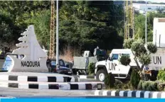  ?? — AFP ?? NAQOURA, Lebanon: Vehicles of the UN peacekeepi­ng force UNIFIL are pictured near the border with Israel yesterday.