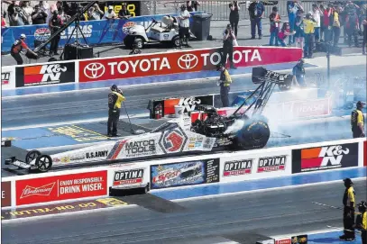  ?? Chase Stevens ?? Las Vegas Review-journal @csstevensp­hoto Top Fuel driver Antron Brown practices on the new four-wide track Friday during the first day of qualifying for the DENSO Spark Plugs NHRA Nationals at The Strip at Las Vegas Motor Speedway.