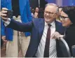  ?? ?? PM Anthony Albanese poses for a selfie with COSBOA summit attendee Elizabeth Picker.