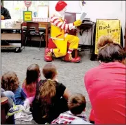  ?? Photo submitted ?? Ronald McDonald delighted children with a visit to the library to lead storytime.
