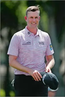  ?? GERRY BROOME/AP PHOTO ?? Webb Simpson had reason to smile afer shooting a 6-under 65 to take the lead after two rounds of the RBC Heritage golf tournament on Friday in Hilton Head Island, S.C.