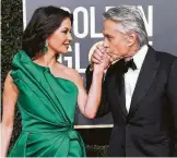  ?? Valerie Macon / AFP / Getty Images ?? Catherine Zeta-Jones and Michael Douglas