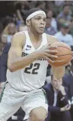  ?? AppHoTo ?? SCORING SPARTAN: Miles Bridges had 33 points in Michigan State’s rout of Houston Baptist last night in East Lansing, Mich.