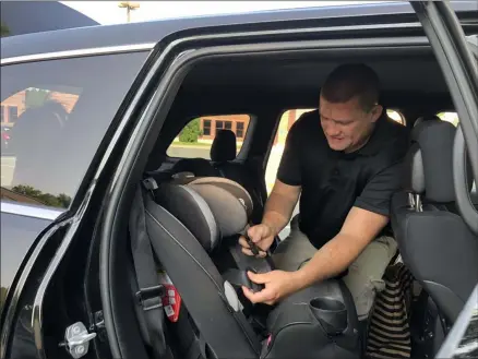  ?? NICHOLAS BUONANNO — MEDIANEWS GROUP FILE PHOTO ?? A car seat gets inspected last year during a safety check in Watervliet.