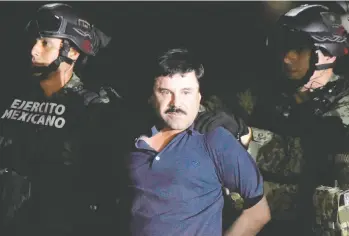  ?? ALFREDO ESTRELLA / AFP VIA GETTY IMAGES FILES ?? Mexican drug kingpin Joaquin (El Chapo) Guzman is escorted into a helicopter at Mexico City's airport. Toronto
trucker Mykhaylo Koretskyy has pleaded guilty to conspiring with Guzman to import cocaine into the U.S.