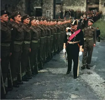  ??  ?? Above Churchill inspects a line of soldiers as Lord Warden of the Cinque Ports, 1946. Right The Anti-aircraft Gun Control Room at Dover Castle