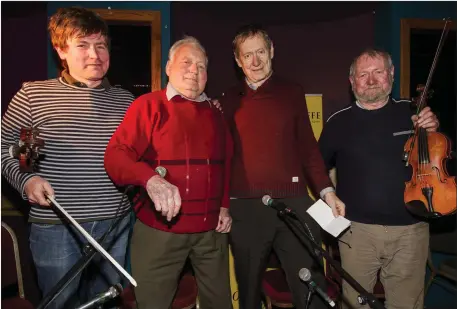  ?? Photo by John Reidy ?? Timmy O’Connor (second left) received the Patrick O’Keeffe Traditiona­l Music Festival Award for his dedication to the musiv of Sliabh Luachra at the River Island Hotel on Sunday night. Included are, from left: Eoin Stan O’Sullivan, Peter Browne and Raymond O’Sullivan.