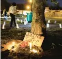  ?? SCOTT OLSON/GETTY ?? People attend a candleligh­t vigil in memory of Tyre Nichols at the Tobey Skate Park in Memphis, Tennessee, on Thursday.