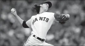  ?? JOSE LUIS VILLEGAS/TRIBUNE NEWS SERVICE ?? Tim Lincecum pitches for the Giants in the NCLS in San Francisco in 2010. Lincecum is schedule to throw for MLB teams in a comeback attempt.