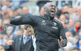  ??  ?? West Brom manager Darren Moore reacts during a match last month.