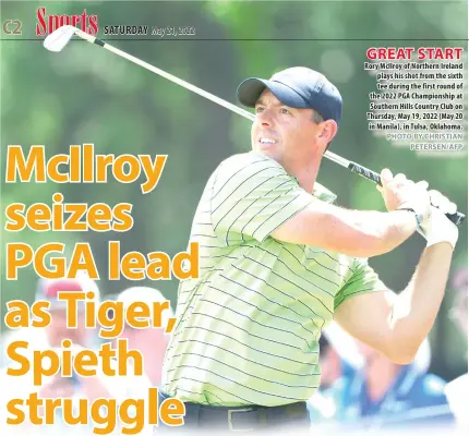  ?? PHOTO BY CHRISTIAN PETERSEN/AFP ?? GREAT START
Rory McIlroy of Northern Ireland plays his shot from the sixth tee during the first round of the 2022 PGA Championsh­ip at Southern Hills Country Club on Thursday, May 19, 2022 (May 20 in Manila), in Tulsa, Oklahoma.