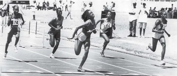  ??  ?? Manchester High’s Kerry-Ann Watson (second right) scoring an upset win in the Milo Girls’ Championsh­ips Class 2, 100 metres hurdles final on March 19, 1994. Watson won in 14.62 second ahead of Wolmer’s Monique Hacker (second left) 14.68 and St Jago’s...